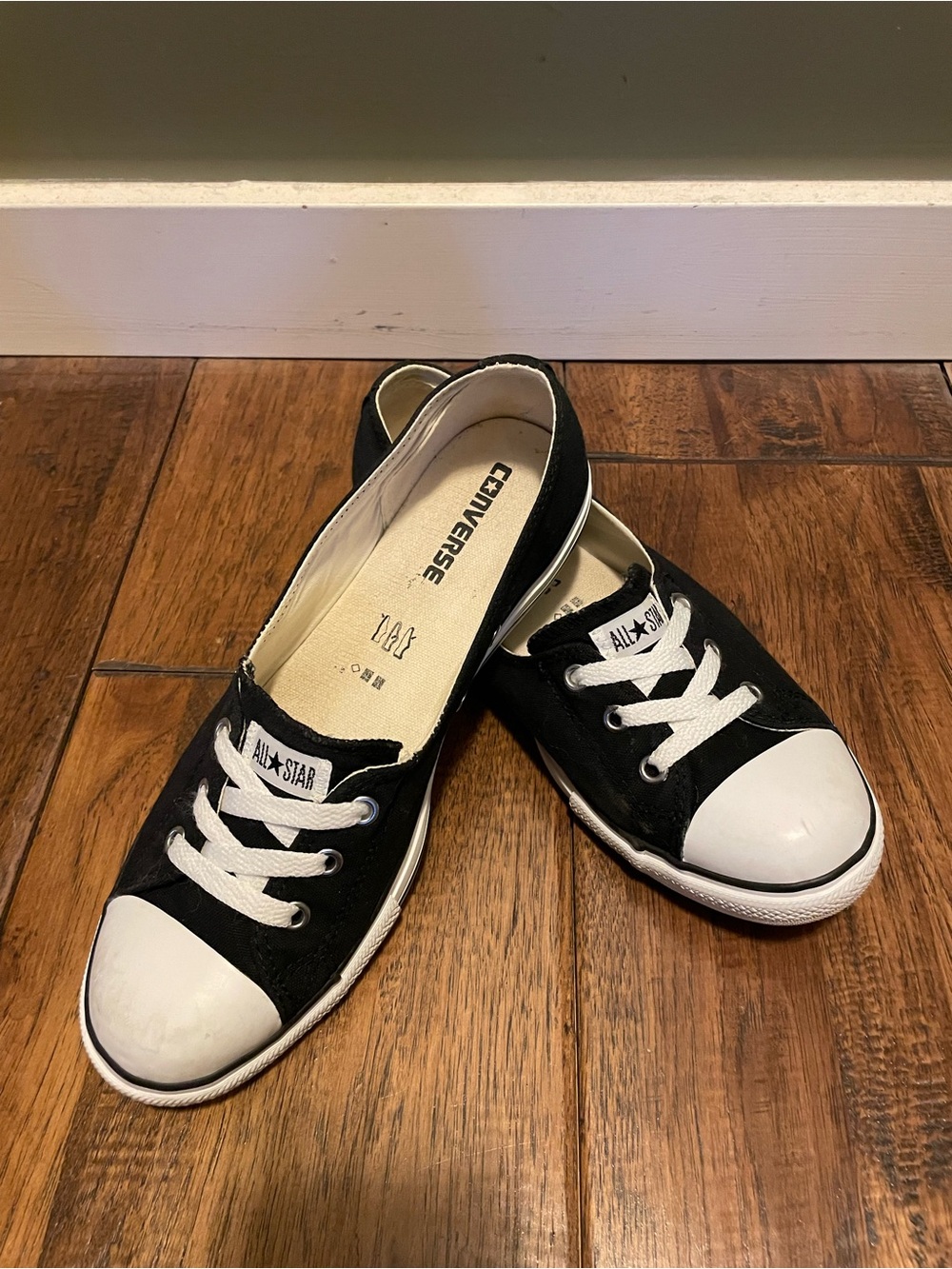 Converse Women’s Black and White Low-Top Slip-On Sneakers